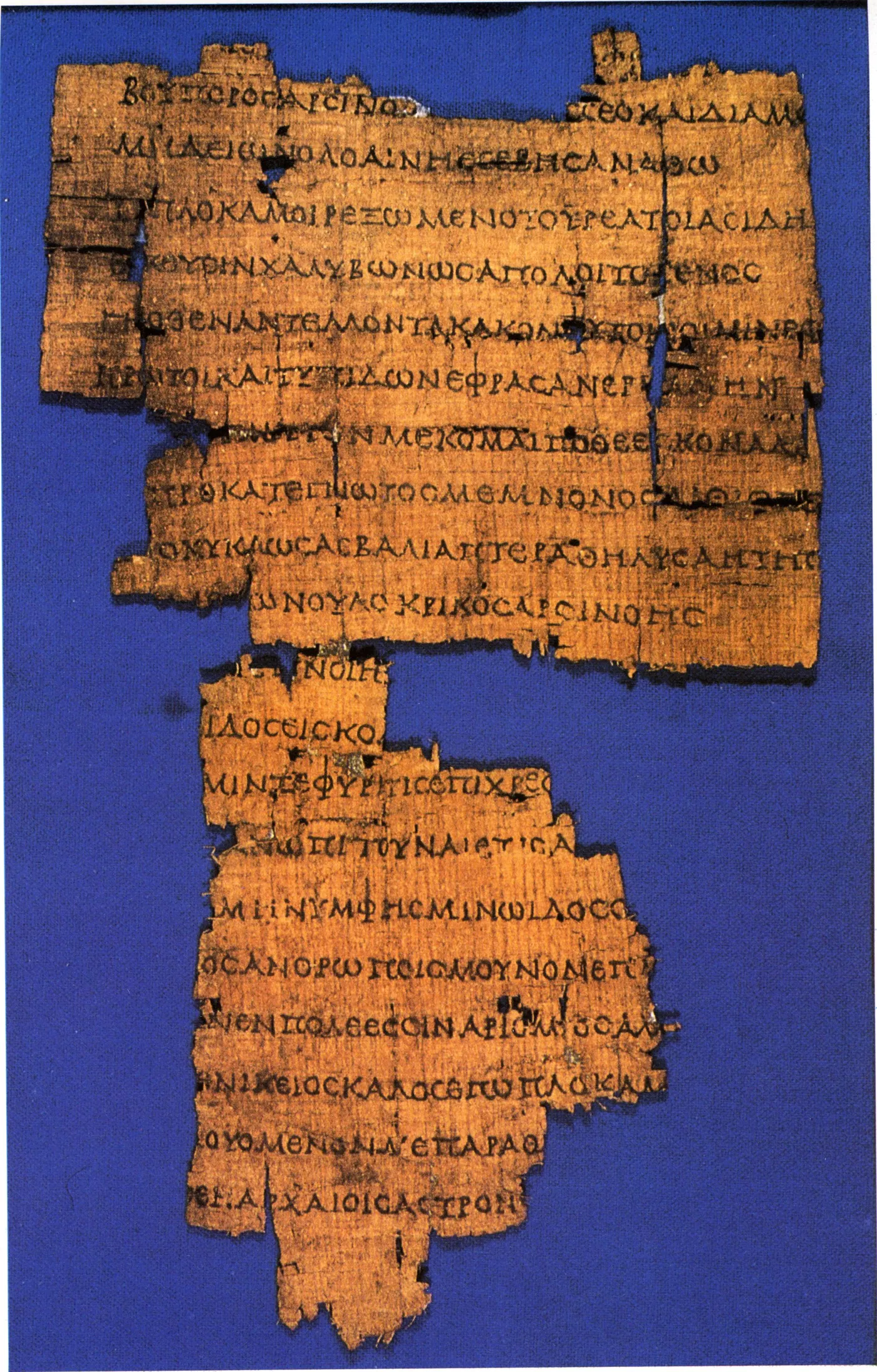 A papyrus fragment of Callimachus's Lock of Berenice (1st-century BCE copy; Florence, Biblioteca Medicea Laurenziana, PSI 1092). The Pinakes he compiled are lost; what survives is his own poetry, copied and catalogued by others.