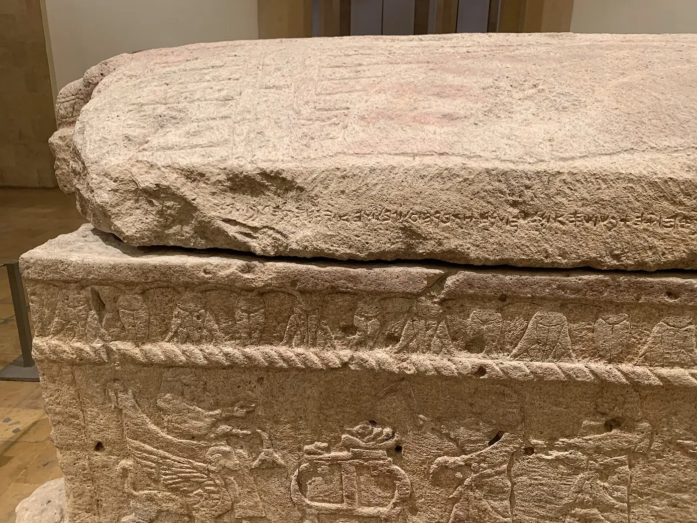 The Ahiram sarcophagus inscription (Byblos, c. 1000 BCE; National Museum of Beirut), among the earliest longer texts in the Phoenician alphabet. Twenty-two signs that would grow into the scripts of half the world.